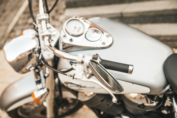 Close up of motorcycle, chopper bike in the town.
