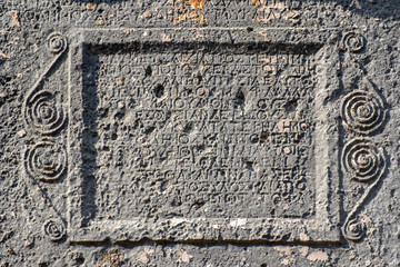 Inscription on twin Rock Tomb in Sidyma Ancient City, Mugla, Turkey