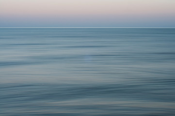 Obraz premium Sunset over the sea. Summer time. Summer sea relax. Ocean blue.