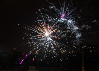 Firework on New Year's Eve over the city.