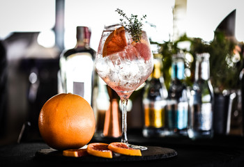 gin tonic with slices of fresh grapefruit