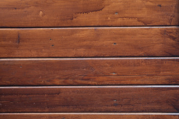 Dark wooden background. Striped brown wood background