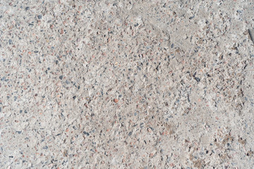 Gray background of fine stone. Decorative stone in concrete