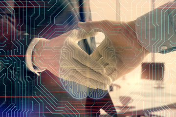 Double exposure of brain drawing on office background with two men handshake. Concept of innovation