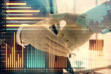 Multi exposure of financial chart and map on office background with two businessmen handshake. Concept of success in business