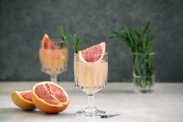 Grapefruit and rosemary alcohol drink, front view