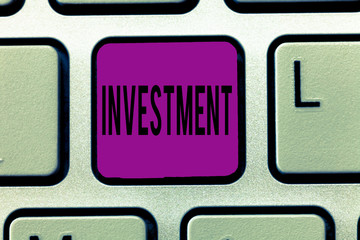 Writing note showing Investment. Business photo showcasing Action or process of investing money for...