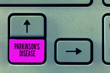 Writing note showing Parkinson s is Disease. Business photo showcasing nervous system disorder that affects movement.