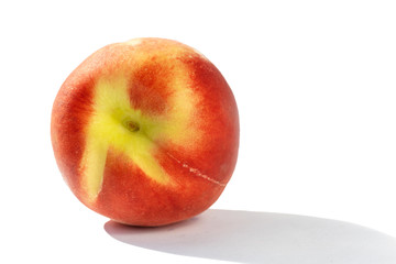 juicy ripe peach in natural sunlight, isolate