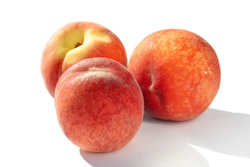 juicy ripe peaches in natural sunlight, isolate