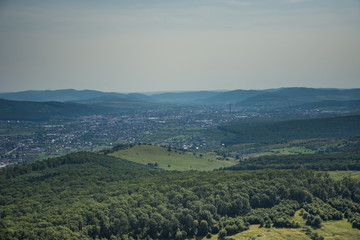 Fototapeta na wymiar ROMANIA Bistrita view from the plane,august 2019,panoramic image over the hills