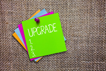 Conceptual hand writing showing Upgrade. Business photo showcasing Raise something to higher...