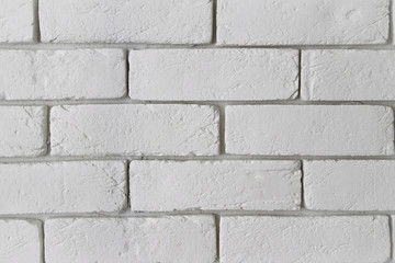 Modern white brick wall texture as a background. Abstract backdrop