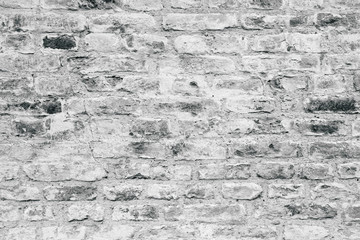 Grey brick wall texture as a background. Abstract backdrop