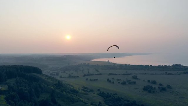 Ram-air parachute is flying towards the camera