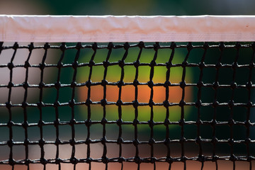 Tennis net with dark background 