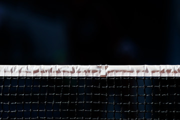 Tennis net with dark background 