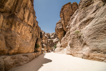PETRA, JORDAN - May, 2019: Tourists on the way to the city of Petra in Jordan