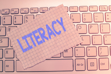 Writing note showing Literacy. Business photo showcasing ability to read and write competence or knowledge in specified area.
