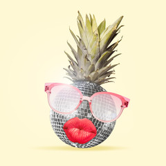 Al alternative view of usual fruits. Pineapple as a disco ball in eyeglasses sending kisses on...