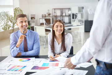 Fototapeta premium Team of architects discussing project in office