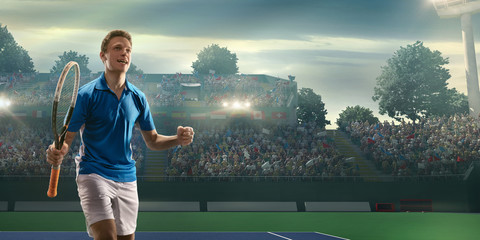 Male tennis player rejoices in victory on a professional court