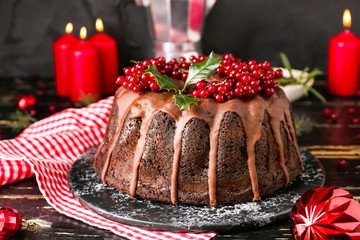 Tasty Christmas pie on wooden table