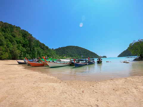 tour boats waiting tourism at mai ngam beach mu ko surin national park attraction chumphon province in thailand
