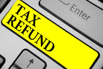 Writing note showing Tax Refund. Business photo showcasing applied when money liability is less than the paid ones Keyboard yellow key Intention computer computing reflection document