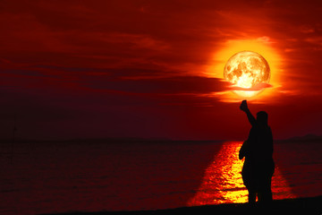 Couple lover selfie with full Sturgeon on sea and reflection moonlight on water surface © darkfoxelixir