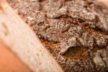 Close up of crust of a fresh cut bread