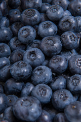  Clean freshly picked blueberries - close up studio shot. ( Ingredients:  Antioxidants , Vitamin C, Antioxidant)