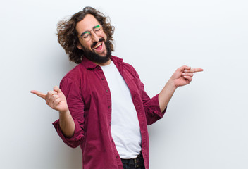 young man with crazy hair in motion dancing and celebrating his