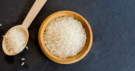Raw rice on the table close up