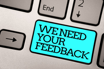 Text sign showing We Need Your Feedback. Conceptual photo Give us your review thoughts comments what to improve Silver grey computer keyboard with blue button black color written text