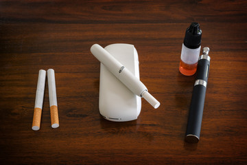 smoke and steam systems in comparison, normal cigarette, tobacco heater with sticks and e-cigarette...