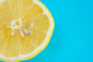 Lemon slices on a blue background