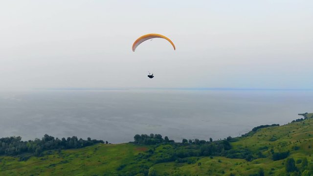Parachute, paragliding comcept. 4K parachuting concept.