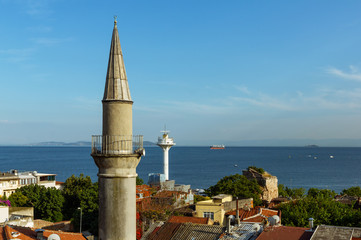 Obraz premium Istanbul landscape view from Sultan Ahmet through minaret and lighthouse on Marmara sea