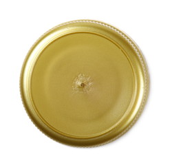 Golden new plastic bottle cap for juice isolated on white, top view, macro