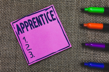 Conceptual hand writing showing Apprentice. Business photo showcasing Person learning training from a mentor Intern Trainee Learner Purple Paper Important reminder Markers Jute background