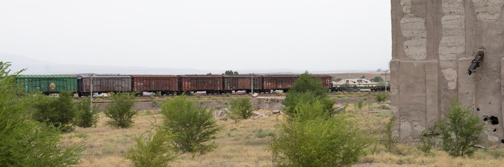 Obraz premium train with train wagon rides by rail