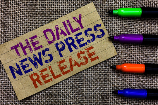 Handwriting text writing The Daily News Press Release. Concept meaning announcing big news or speak to people Paperboard computer mouse jute background Expressing ideas typing needs
