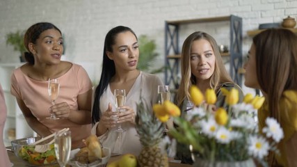 a group of 5 women of mixed race. women laughing and talking on brunch 4K
