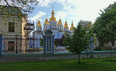 View of the St. Michael's Golden-Domed Cathedral in Kiev from the Vladimir Hill Park. Spring day
