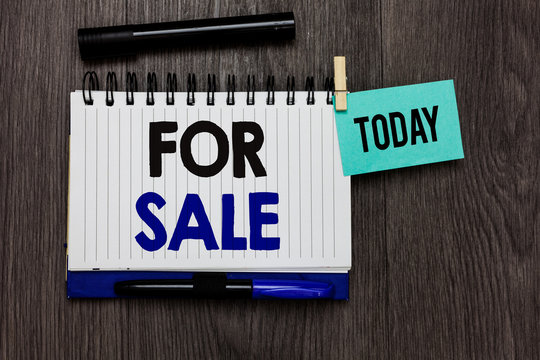 Conceptual hand writing showing For Sale. Business photo text putting property house vehicle available to be bought by others Ideas notebook wooden table markers for today important reminder