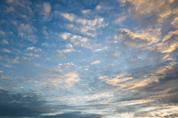 Naklejka na ściany i meble background of sunset clouds on heaven