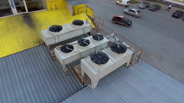 Aerial view. The old air conditioning and ventilation systems on roof of mall.
