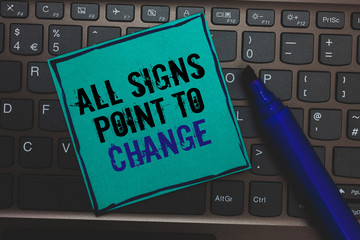Text sign showing All Signs Point To Change. Conceptual photo Necessity of doing things differently new vision Huge button with computer keyboard black lined written blue page marker pen
