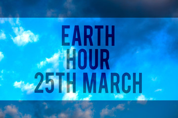 Handwriting text Earth Hour 25Th March. Concept meaning symbol commitment to planet Organized World Wide Fund Multiline text desktop natural blue sky cloudy background send messages